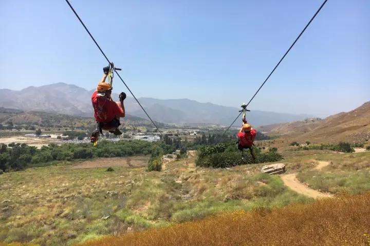 a person riding on top of a hill