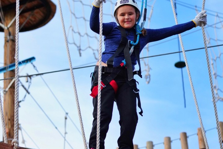 a group of people on a swing
